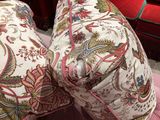 two pillows that are sitting on top of each other