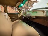a view of the interior of an old car