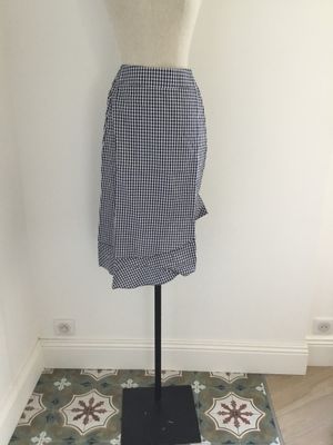 an image of a dress on a mannequin stand