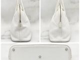 two pictures of a white purse and a white purse with a zipper