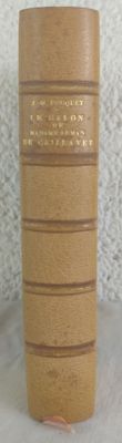 a picture of a book on a table next to a cup