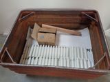 a box of cigarettes sitting on the floor next to a box of cigarettes