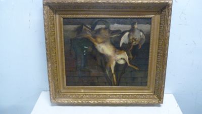 une photo d'un tableau représentant un cerf, dans un cadre doré