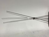 a clock that is on the wall with a bunch of wires attached to it