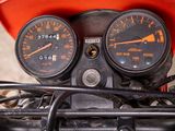 a close up of a motorcycle with two speedometers on it