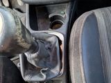 a close up of a car ' s gear lever and gear shift