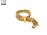 an image of a gold bracelet with a chain and a clasp