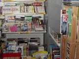 many books on the shelves in this room
