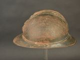 a helmet on a stand on a gray background