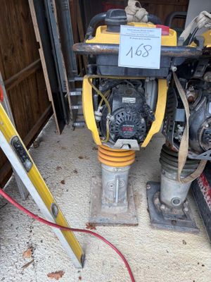 a yellow and black fire hydrant in a garage