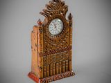 a wooden clock that is sitting on a table