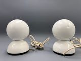 pair of white ceramic table lamps with black bases