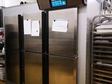 an image of a commercial kitchen with stainless steel appliances