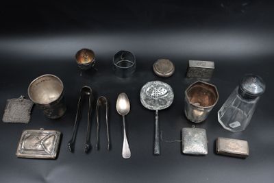 a lot of silver objects on a black surface