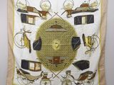 an image of a scarf with various items on it