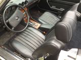 a picture of the interior of a car with leather seats