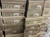 boxes stacked on top of each other in a warehouse