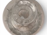 underside view of a clear glass cup with a white background
