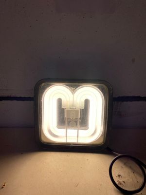 a light that is on in the corner of a room