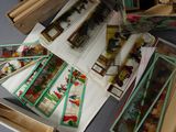a pile of books with pictures on them sitting on a table