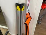 two skis that are sitting next to each other on the floor
