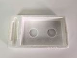 a white sink with two holes in it