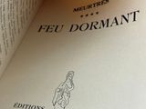an open book with a picture of a woman on it