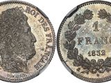 a close up of a coin on a white background