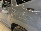 a close up of a car that has a sticker on it