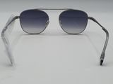 a close up of a pair of sunglasses on a white surface