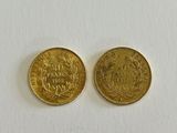 two gold coins, one of which is a sovereign and the other of which is a sovereign