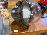 a table with a lamp on it in a room