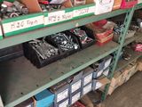 many boxes of tools on the shelves in the garage
