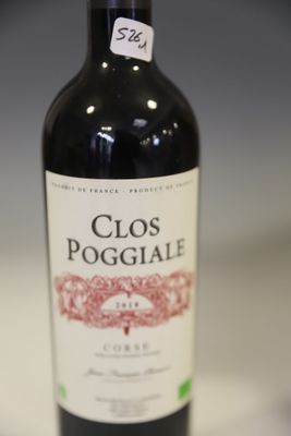 a bottle of wine that is sitting on a table