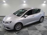 a picture of a silver car parked in a showroom