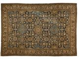 un tapis persan ancien aux motifs bleus et marron