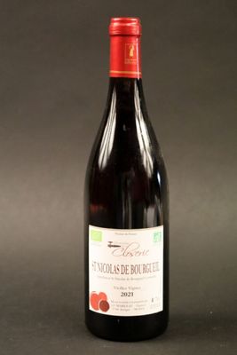a bottle of wine that is sitting on a table