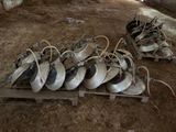 a lot of shoes that are sitting on a pallet