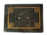 a black box with a gold border on it