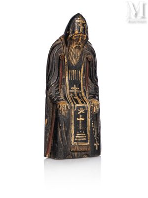an image of a statue of a man with a long beard