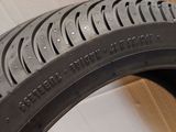 a close up of a tire on a cardboard box
