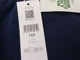 the label on the back of a t - shirt shows the price tag