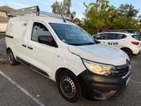 a white van that is parked in a parking lot