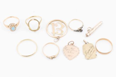 an assortment of rings and pendants,