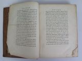 a book open on a table with a page in it