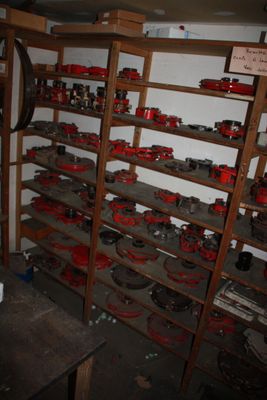 a room with a bunch of tools on the shelves