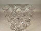 a lot of empty wine glasses sitting on a table