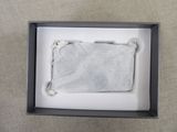 a bag of tea sitting in a box on a table