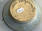a plate with writing on it on a table