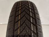 a close up of a tire on a white surface